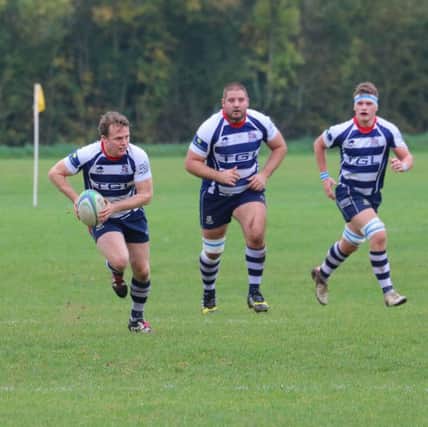 Banbury Bulls' Ed Phillips looks for support at Oxford Harlequins