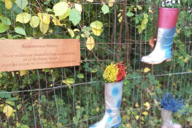 Peaceful garden's remembrance wellies for students who have lost loved ones NNL-160211-094526001