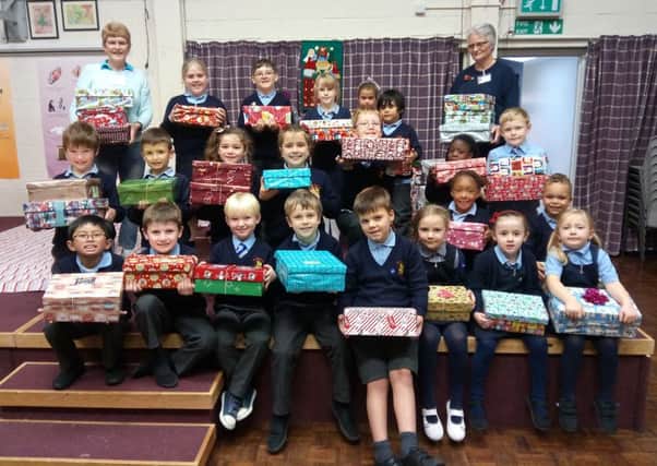 St Johns Primary School with the Christmas Shoebox appeal coordinators Eunice Harradine and Ruth Panle NNL-160711-173558001