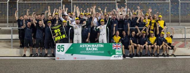 The Aston Martin team celebrate their 2016 World Endurance Championship glory in Bahrain