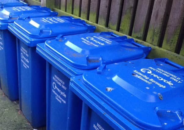 Blue recycling wheely bins NNL-140224-112755001