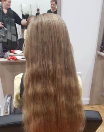 Izzy Morris before donating 30 cm of her hair to the Little Princess Trust NNL-161213-144745001