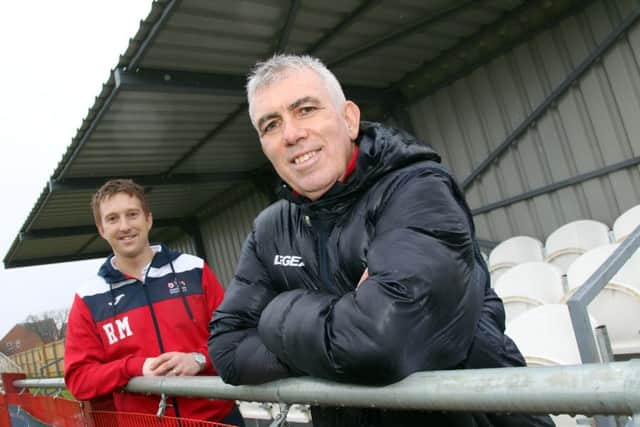 Easington Sports chairman Richard Meadows and manager Phil Lines in the new stand at Addison Road