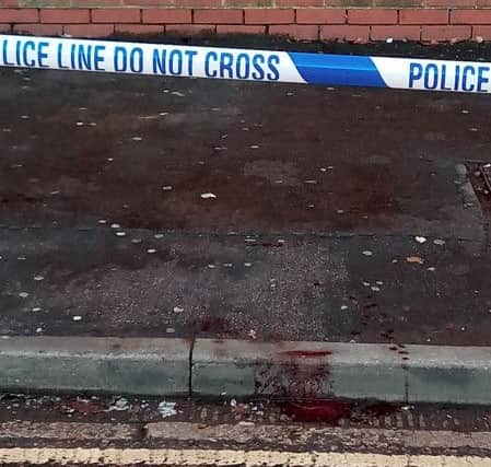 Blood found on George Street pools into the road NNL-161214-120927001