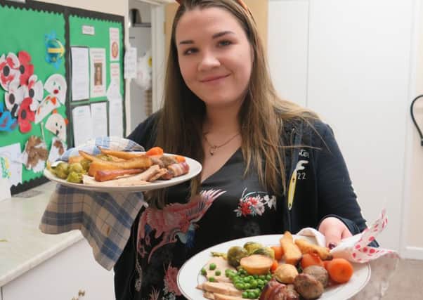 Erin Lilley, volunteer and keyboard player at the Bloxham community Christmas lunch NNL-161228-124910001