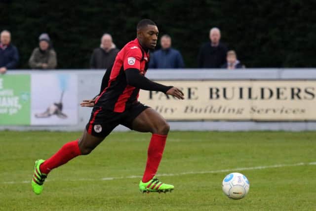 Lee Ndlovu set up both goals for Brackley Town against Stockport County