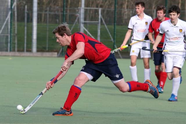Banbury's Simon Boardman goes on the attack against Guildford