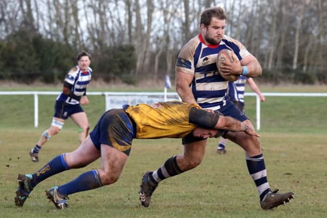 Banbury Bulls' Cashel Chilvers tackled against Old Centralians at Bodicote Park