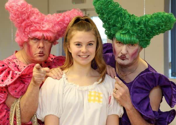 Keeley Thompson with the Ugly Sisters played by Keith Fraser and Stuart Dawe