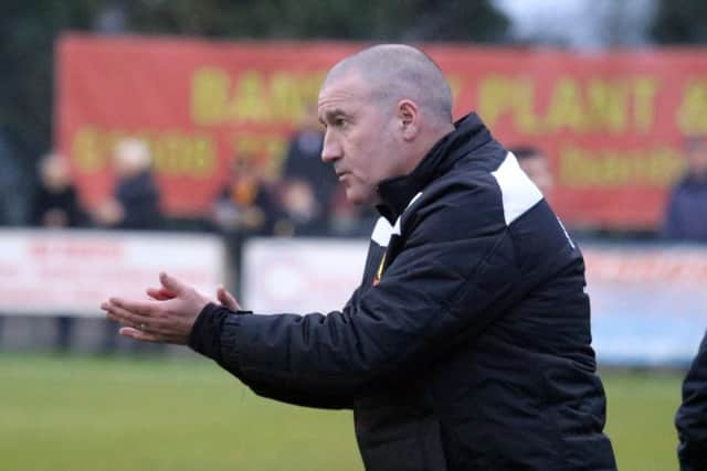 Banbury United manager Mike Ford must pick his players up for Saturday's clash with Cambridge City