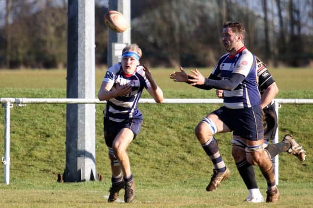 Banbury Bulls' Freddie Cracknell and Simon Brand keep their eyes on the ball against Chinnor Falcons at Bodicote Park