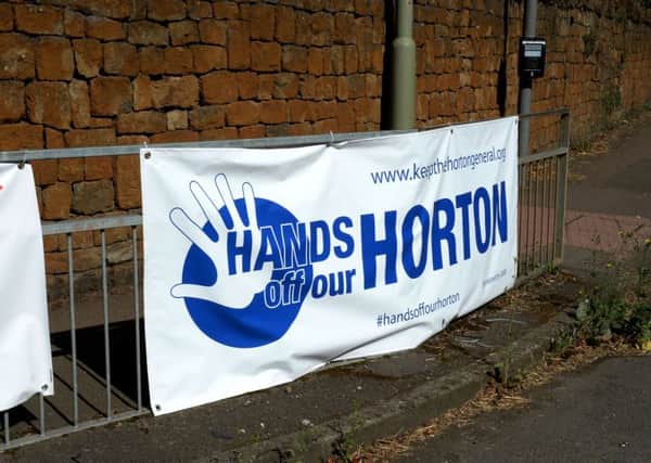 Hands Off Our Horton banners. Adderbury. NNL-160823-132255009
