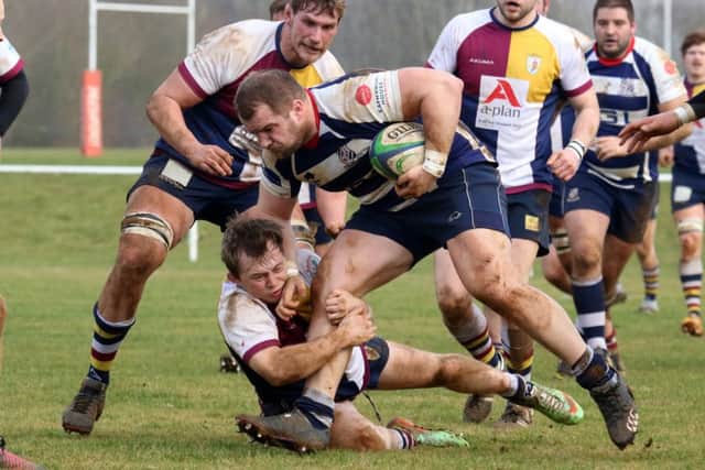 Cashel Chilvers tries to power through for Banbury Bulls against Oxford Harlequins at Bodicote Park