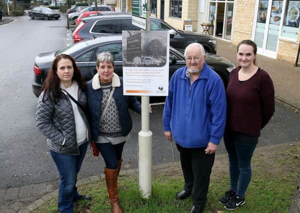 West Oxfordshire District Council is running a campaign to resist being forced to join a unitary Oxfordshire which they believe would threaten free parking in the district.
Pictured are Becs Hinds from the Eden Cafe, district councillor Carol Reynolds, market trader Dave Edwards and Rebecca Hogarty from Brown Bear baby and children's shop  
Picture: Ric Mellis
Woolgate Car Park, Witney, Oxfordshire, 17/2/17 WODC One Council