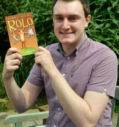 Author, Lawrence Prestidge, in Great Bourton, with his children's book, Rolo. NNL-160706-140223009