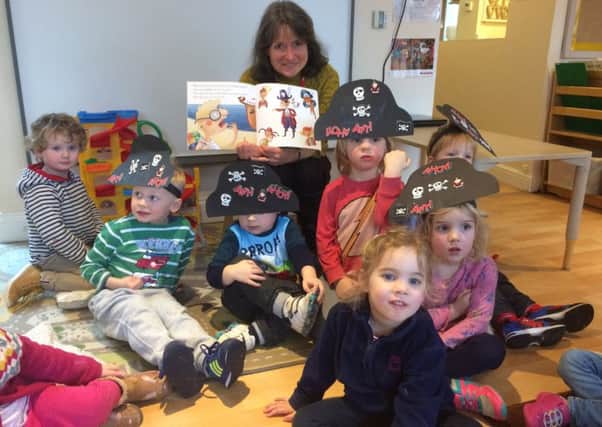 Julie Fulton with children at Winchcombe Farm Day Nursery