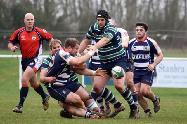 Banbury Bulls' Cashel Chilvers is tackled against Reading Abbey at Bodicote Park