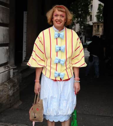 Grayson Perry arrives at the Esquire Singular Suit Launch Party at Somerset House, in London. PRESS ASSOCIATION Photo. Picture date: Wednesday 29, July 2009. Photo credit: Ian West/ PA Wire B11285411248899050A