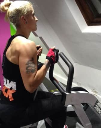 Kate Warner trains her back at Fit4less