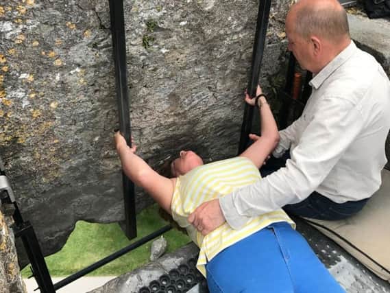 Sue Bradbury kisses the Blarney Stone