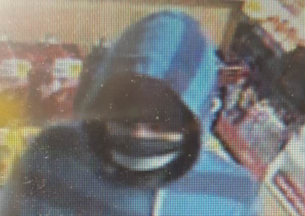 Police want to speak to this man in relation to an armed robbery at a Banbury shop on Monday, October 23. Photo: Thames Valley Police NNL-171024-103703001