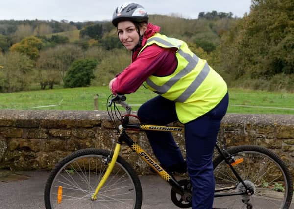 Laura Ene, who works at Glebefields Care Home, Drayton, is cycling for Children in Need. NNL-171024-161455009
