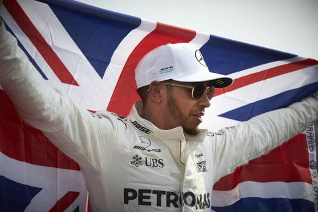 Lewis Hamilton celebrates winning the F1 World Championship for Brackleys Mercedes AMG Petronas team. Photo: Steve Etherington